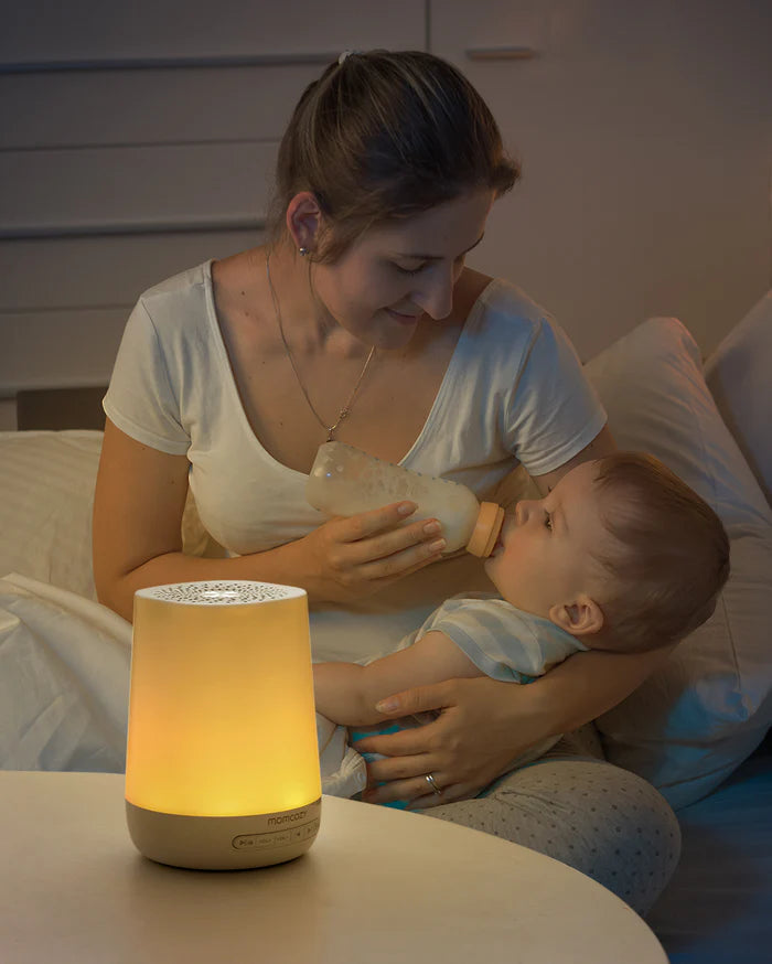 Máquina de sonidos y ruido blanco con luz de noche para bebés Momcozy