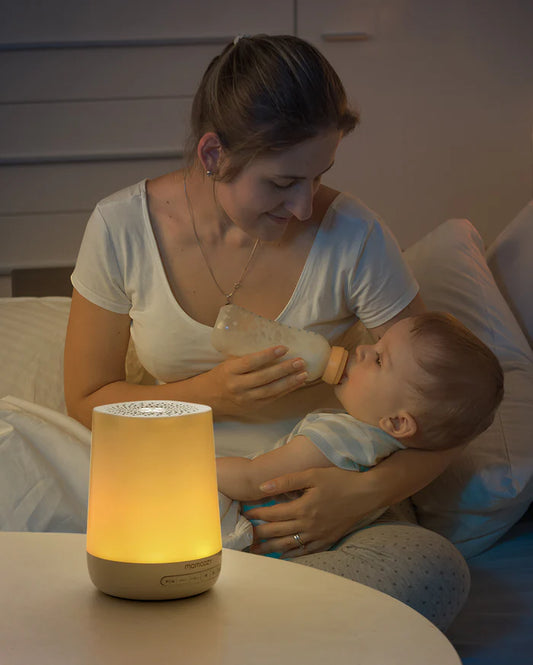 Máquina de sonidos y ruido blanco con luz de noche para bebés Momcozy